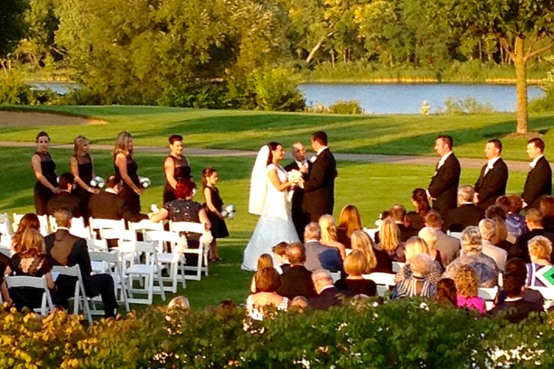 Getting married in front of the lake. Weddings at White Deer Run Golf Club Vernon Hills, Illinois.